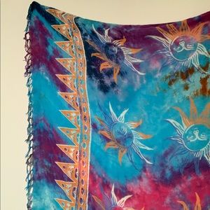 EARTHBOUND multicolored sun tapestry.